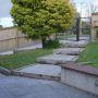 paved outdoor patio timber bench seat 