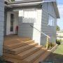 deck with stainless steel handrail