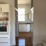 Bungalow kitchen & laundry renovation - new and reconfigured kitchen includes pantry behind kitchen and new laundry beyond.