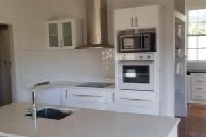 Bungalow kitchen renovation - reconfigure existing kitchen for new kitchen layout including new benchtops.  New walk in pantry behind kitchen. 